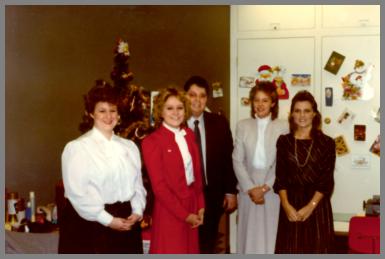 Five WCM Cincinnati employees at a Christmas party