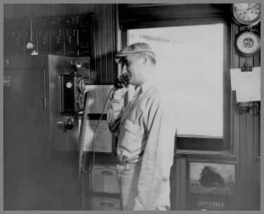 Capt. Homer Johnson talking on the radio