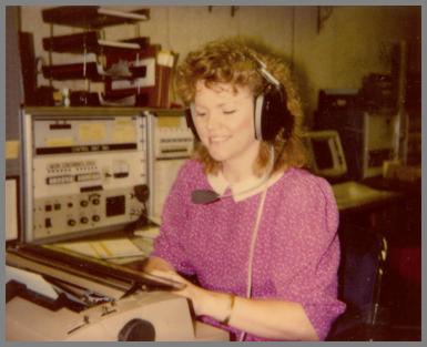 WCM operator, Ann Kamp copies traffic on a typewriter