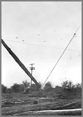 Raising the vertical antenna.