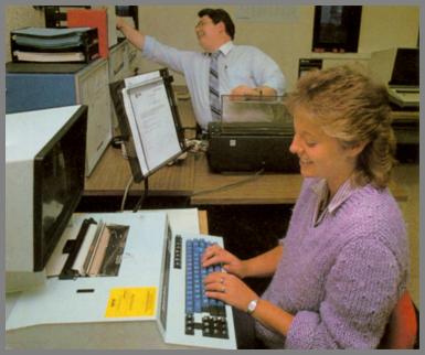 WCM operator, Pam Counts inputs data into the twx machine